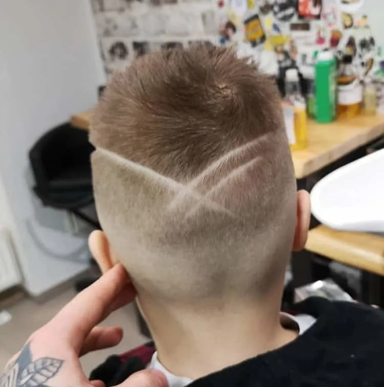 boy's haircut with lines