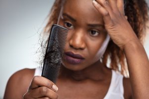 hair relaxers cause hair loss