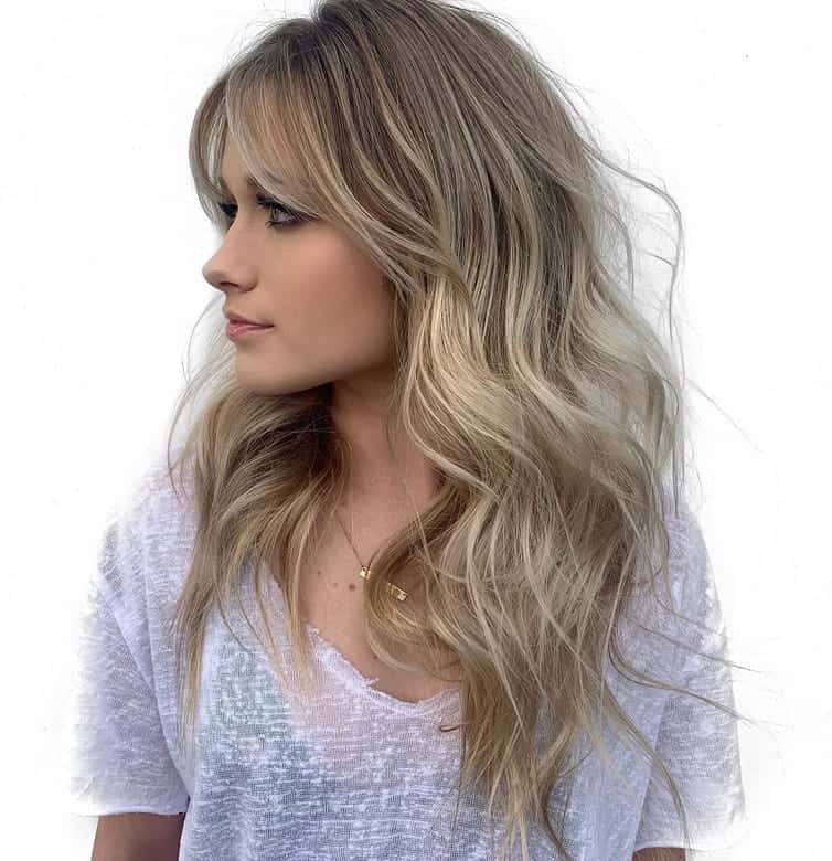Layered Long Wavy Hairstyle for Round Face