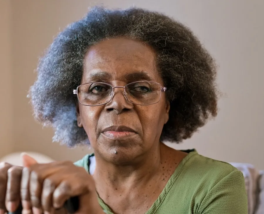 hairstyle for afro women over 60 with long faces