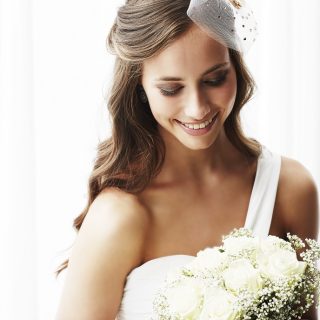 hairstyle for one shoulder wedding dress
