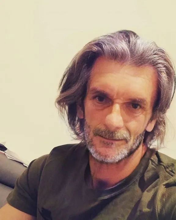 long hairstyle for 50 year old man