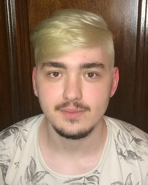 guy with blonde hair and round face