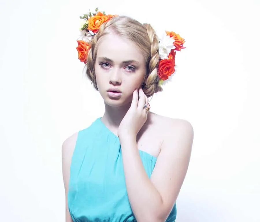 hairstyle with flower for one shoulder dress 