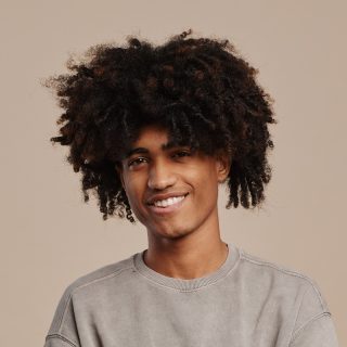 hairstyles for teenage guys with curly hair
