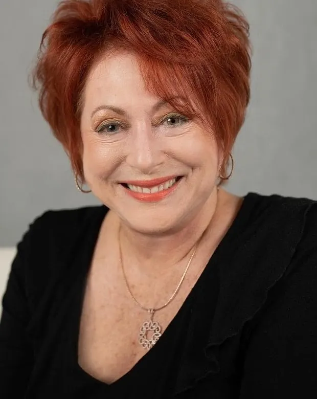 women over 70 with red short hair