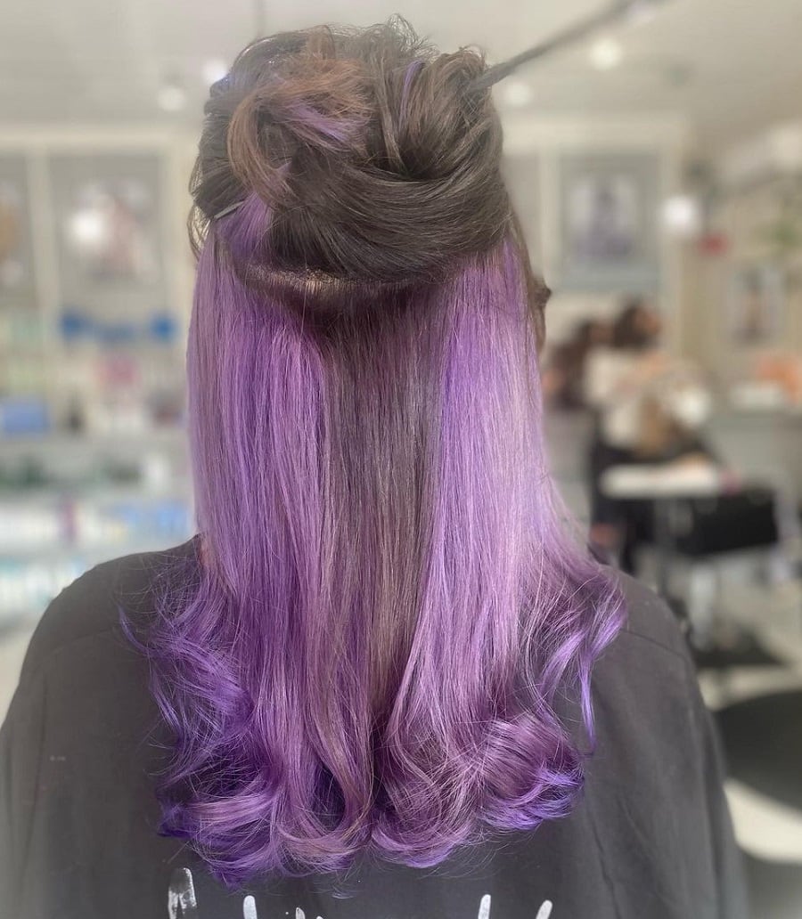 half black updo with purple underneath