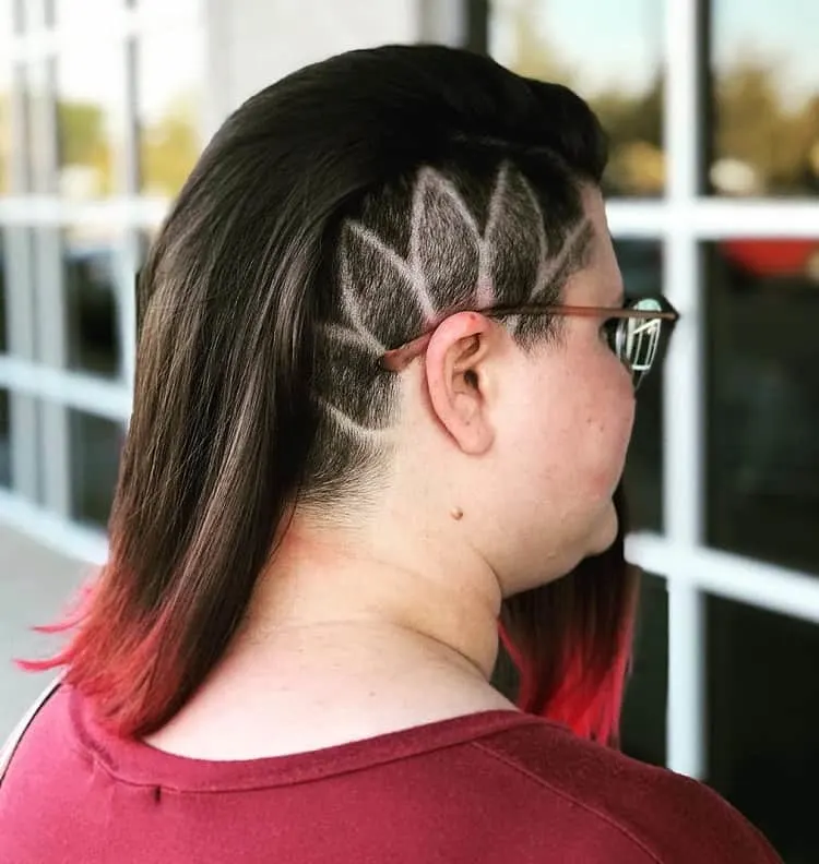 half shaved head with design