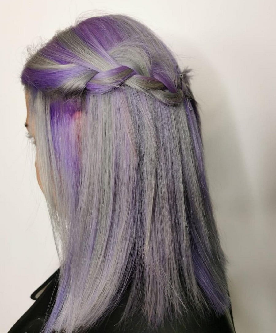 half up braided gray hair with purple highlights