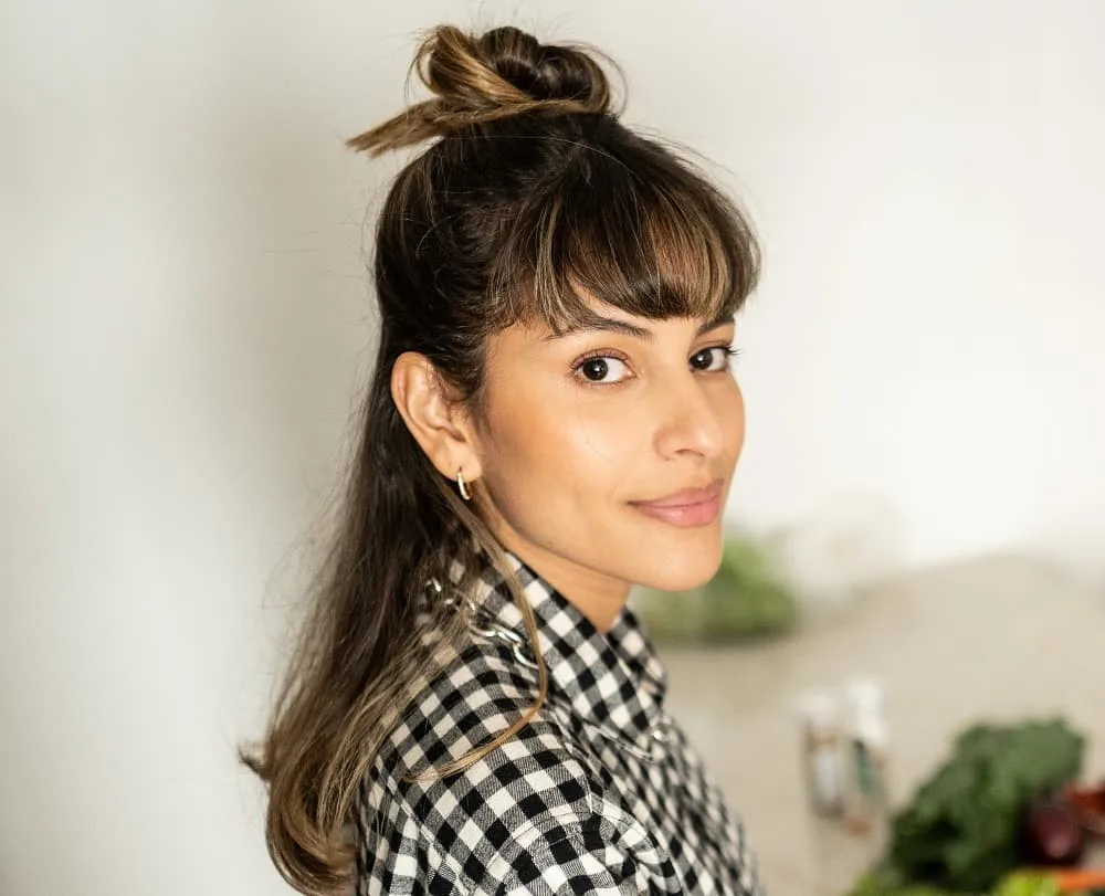 half-up bun with bangs