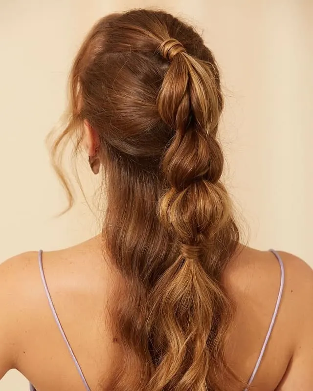 half up half down bubble ponytail style