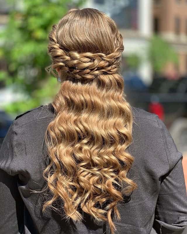 braided half up half down curly hair