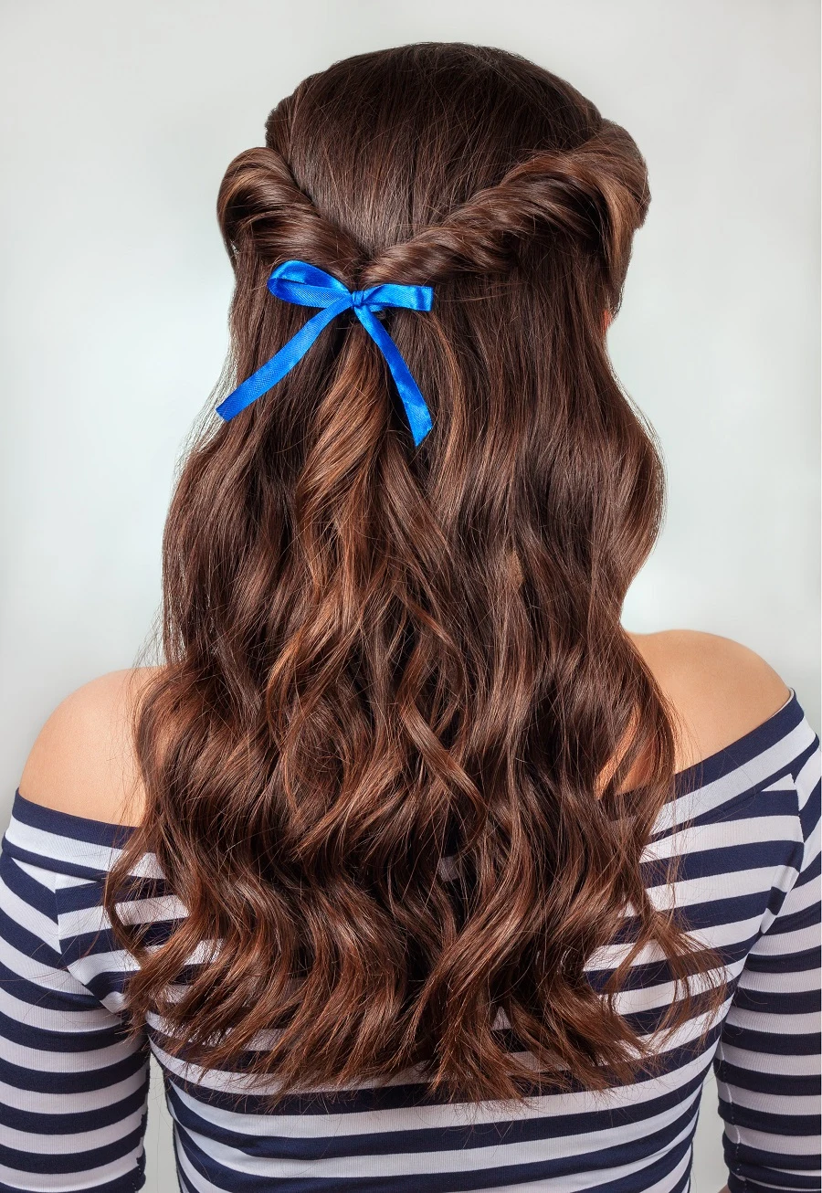 half up half down curly hairstyle