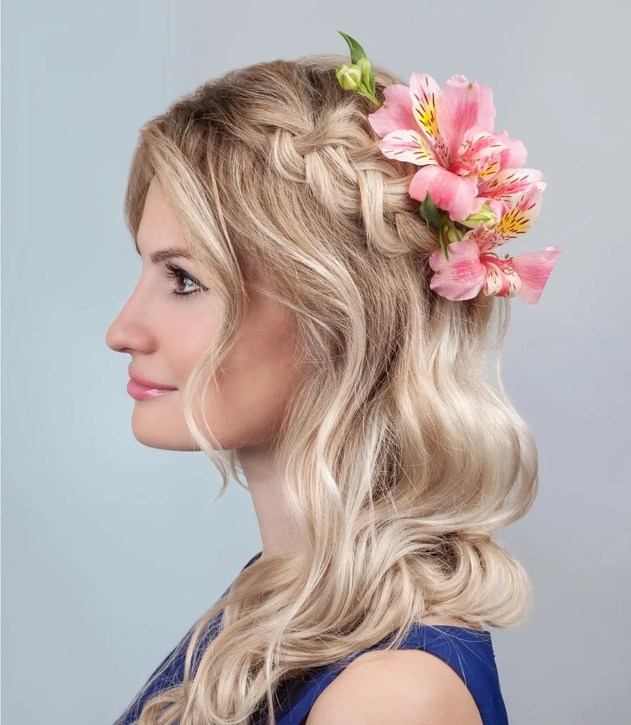 half up half down hairstyle with flower for bridesmaids