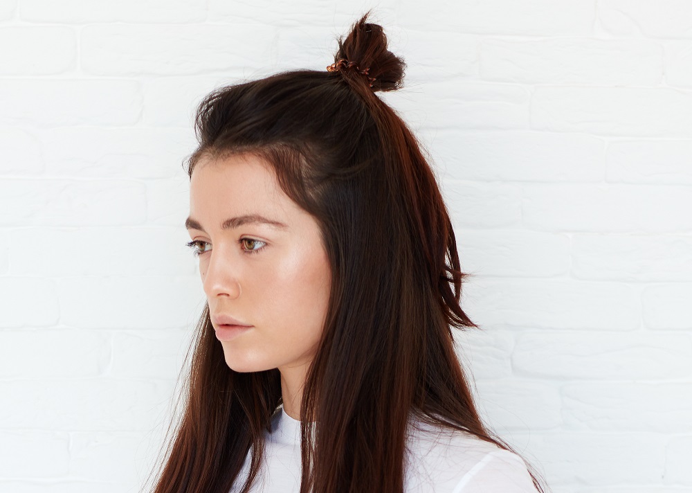 half up top knot style for hiding bangs