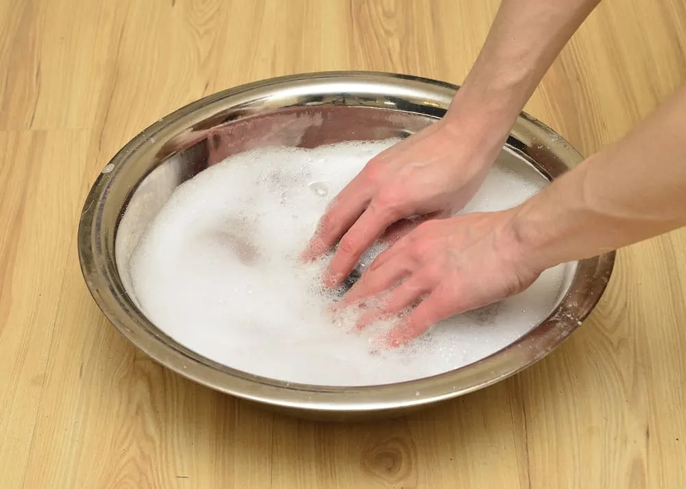 handwashing a white hat