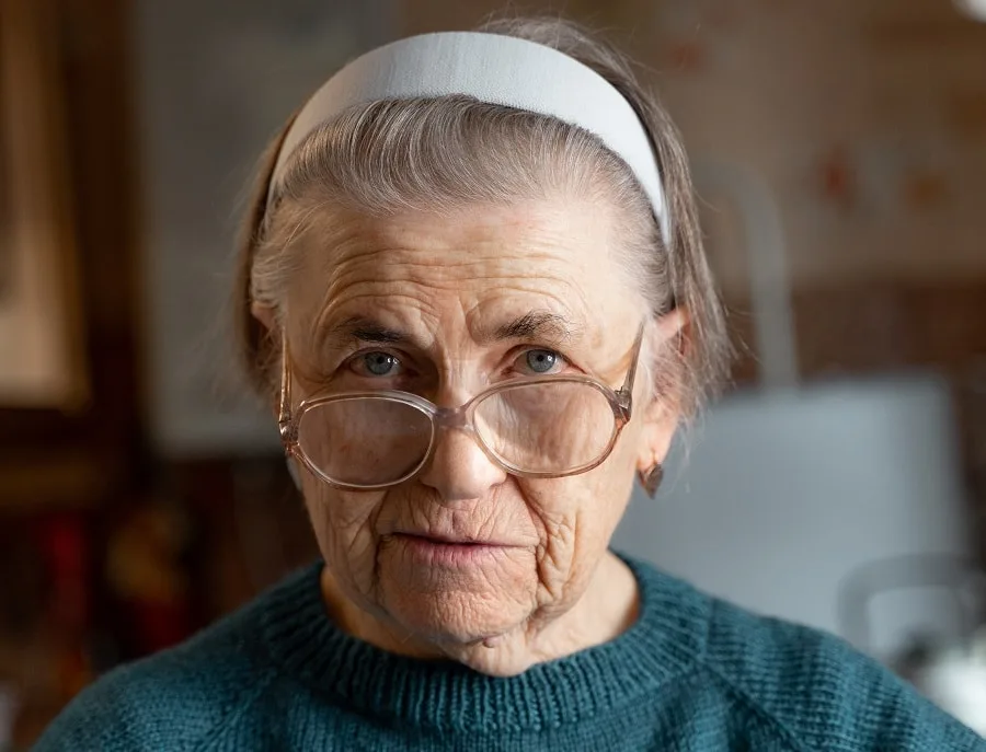 headband hairstyle for 80 year old woman with glasses