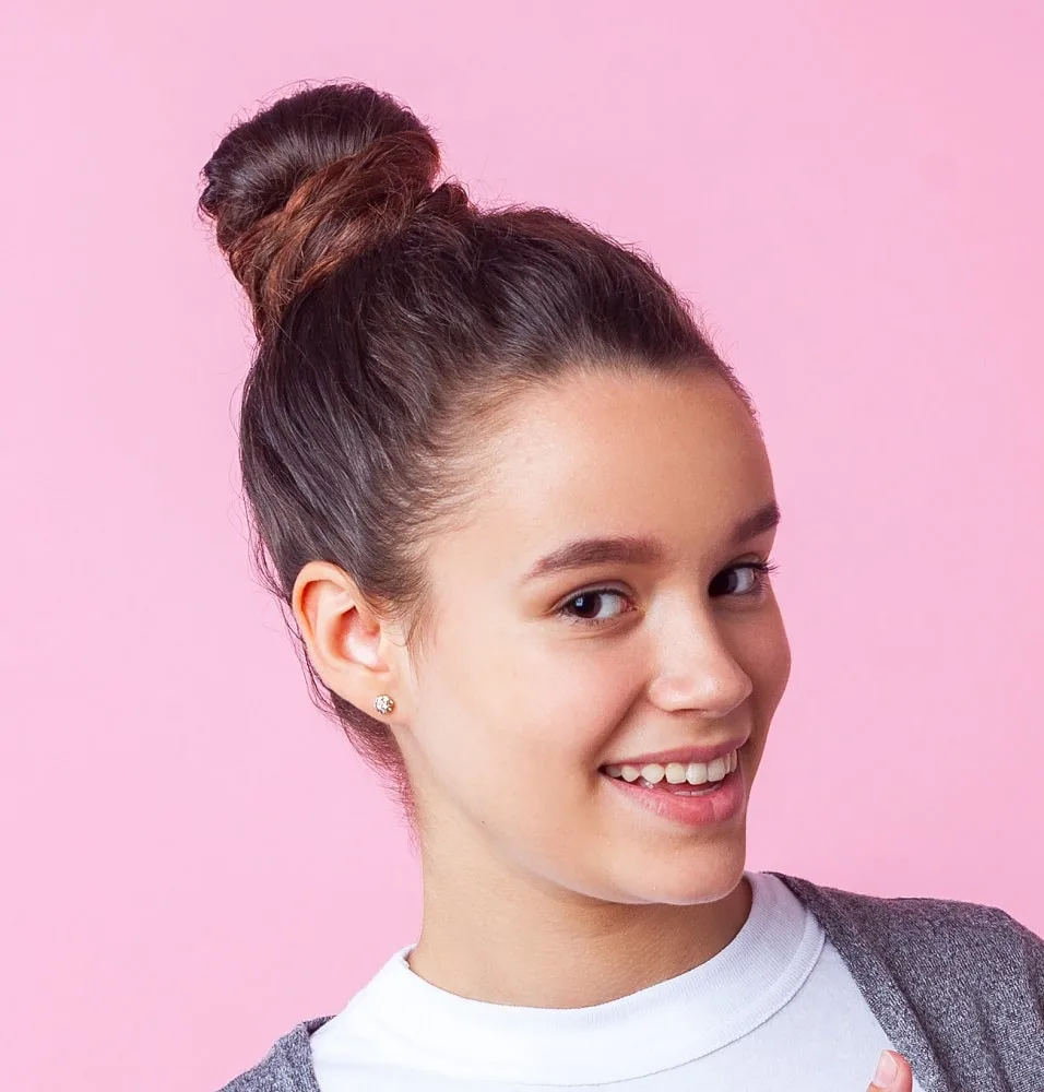 high bun hairstyle for 15 year old girls