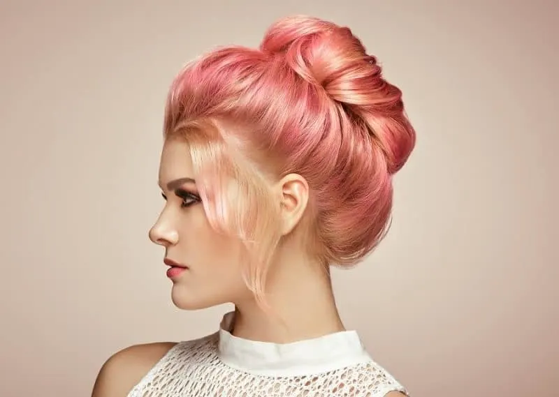 high bun with peach pink hair