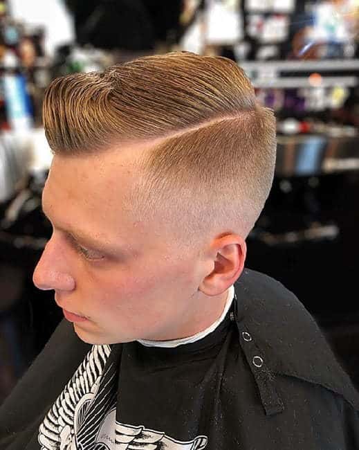 high fade slick back hairstyle for men