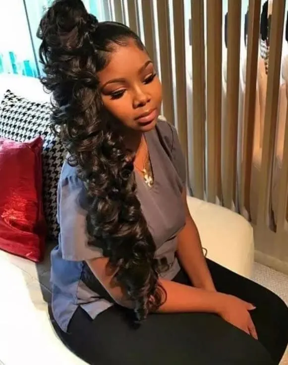 high side curly ponytail with weave