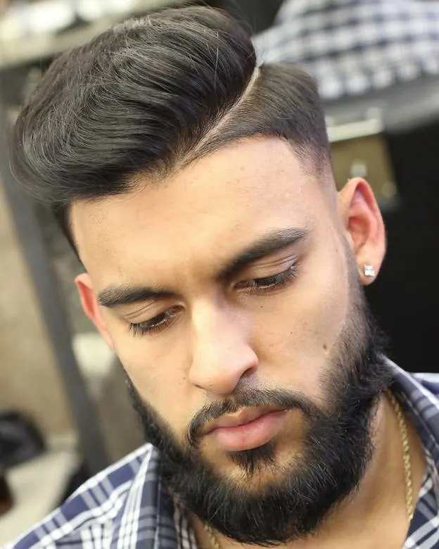 guy with high skin fade haircut