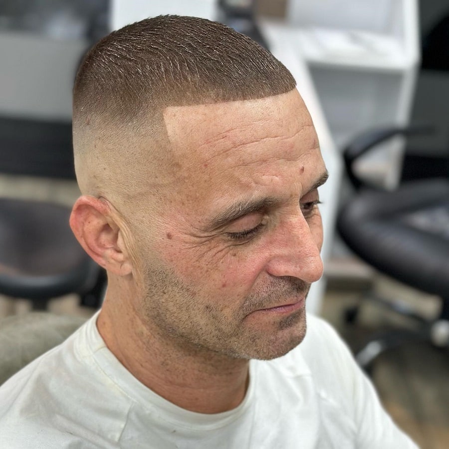 High skin fade for older men with round faces