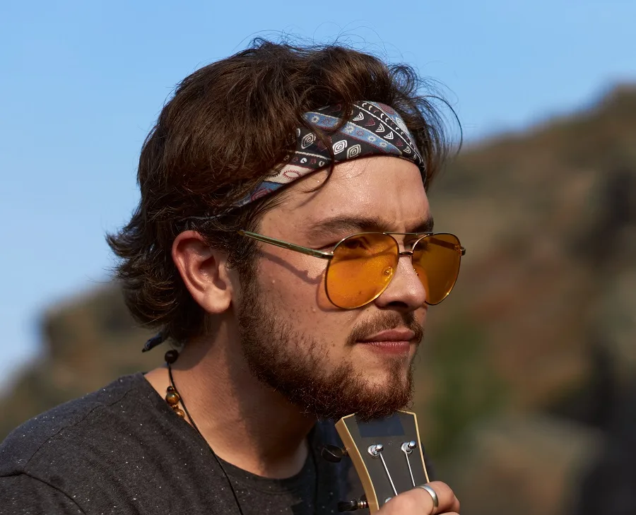 Hippie hairstyle for men with a beard