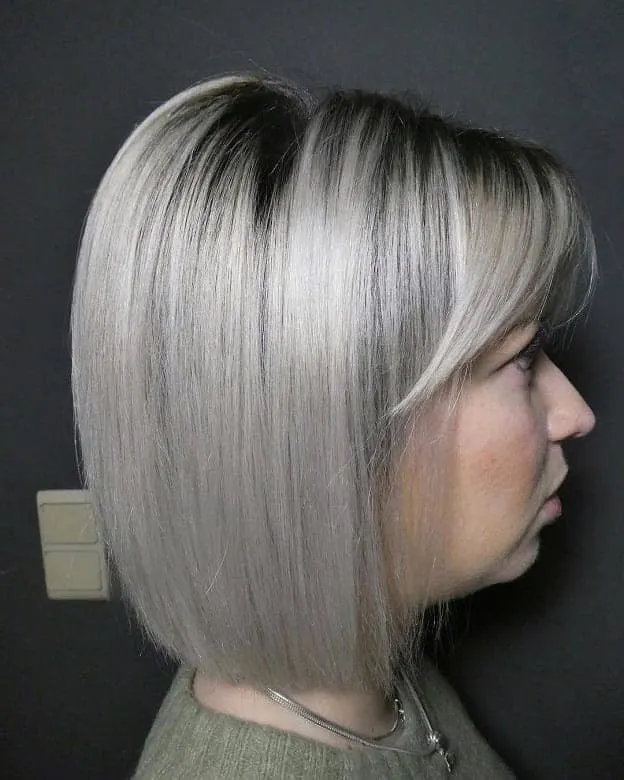 icy blonde bob with bangs