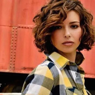 short Curly Bob with Side Swept hairstyle for women