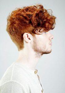 curly fringe hairstyle for men