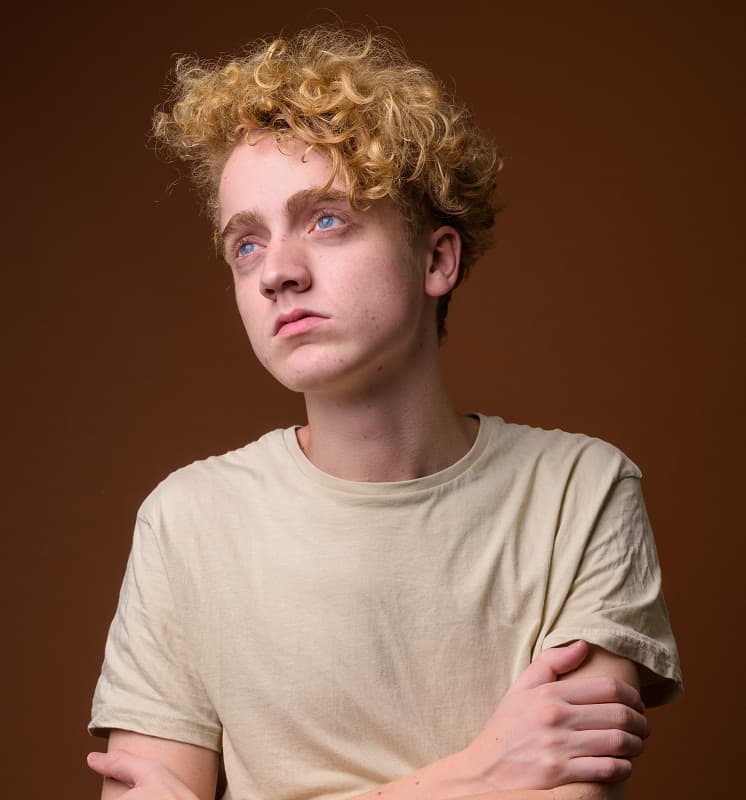 blonde curly jewfro hairstyle