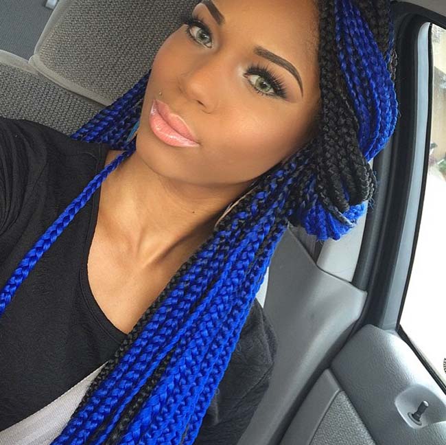 Bright blue jumbo box braids hairstyle for cute girl