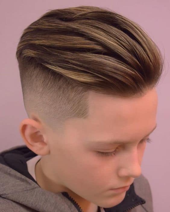 kid's slicked back mohawk with high fade