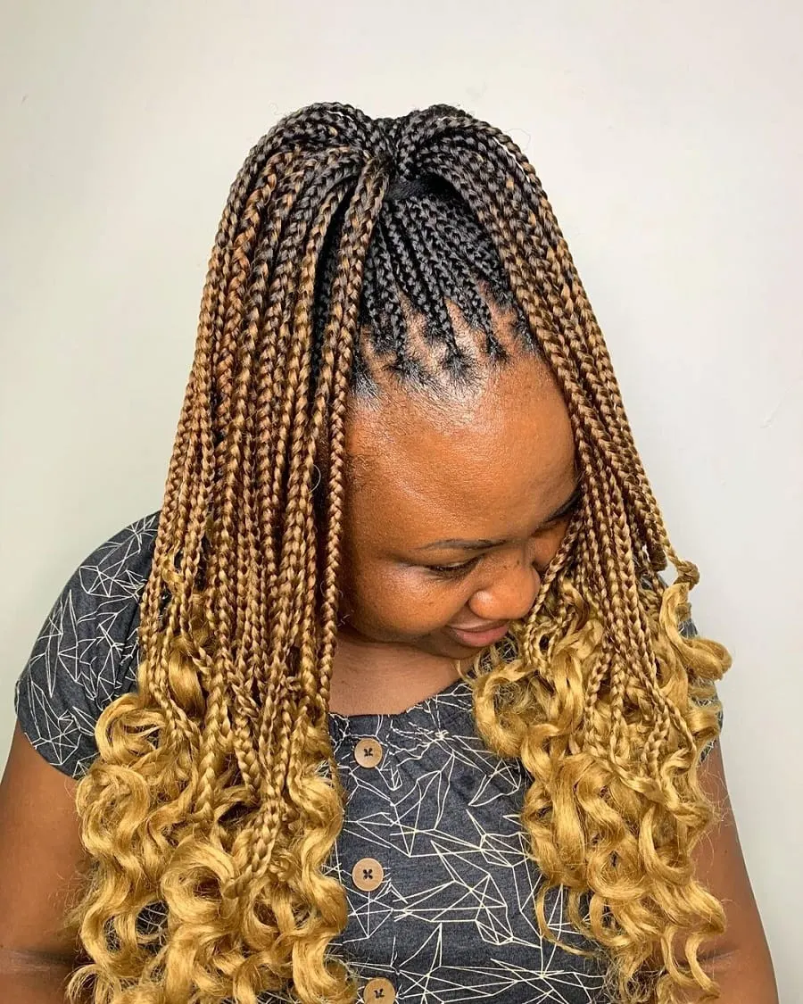 knotless braided ponytail with curly ends