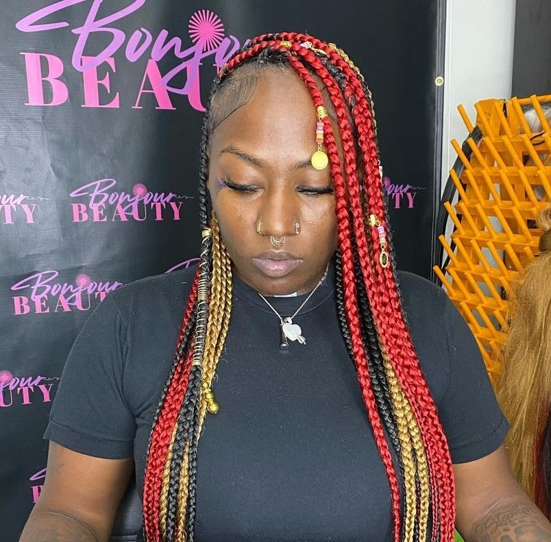 large knotless braids with beads for dark skin