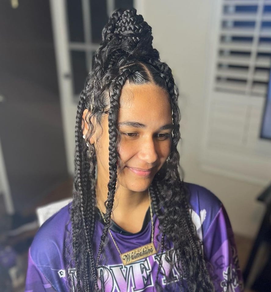 large knotless braids with curls