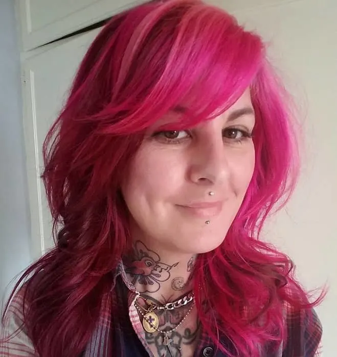 curly pink hair and side swept bangs