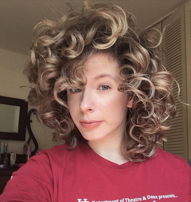layered blonde curly hair