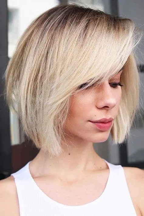 Medium Layered Bob with Side Swept Bangs