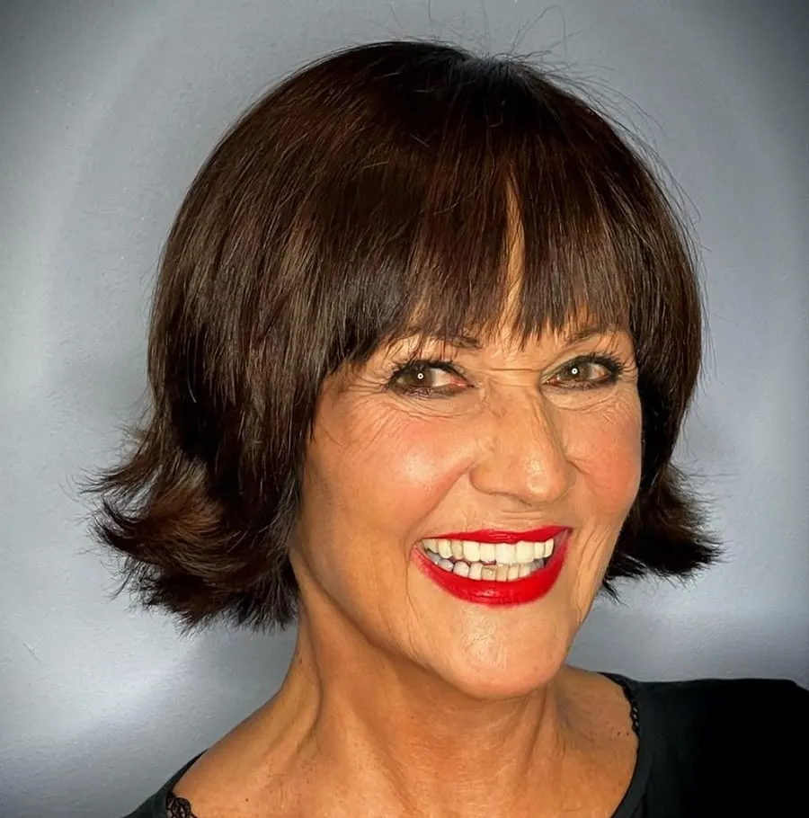 layered bob with bangs for fine hair over 50