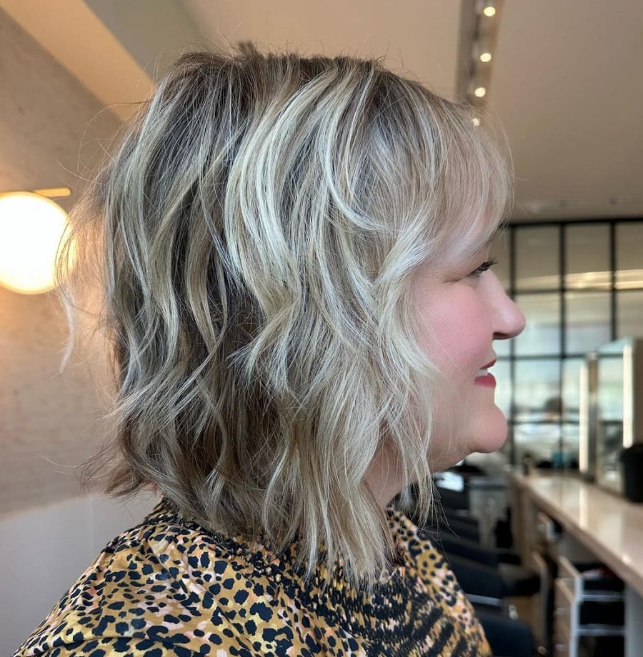 layered bob with highlights for women over 50