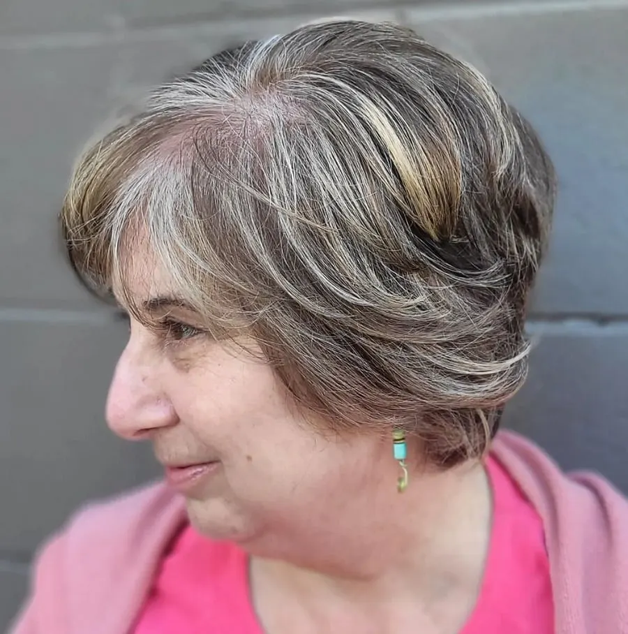 layered bob with highlights for women over 60