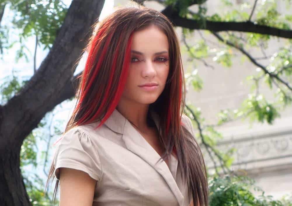 layered brown hair with red highlights