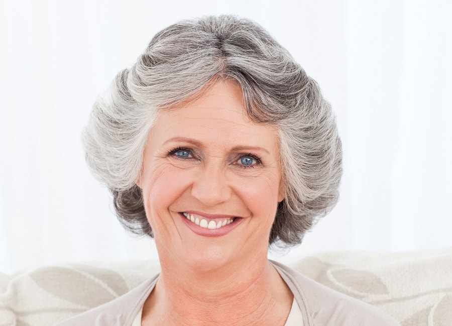 Layered feather hairstyle for women over 60