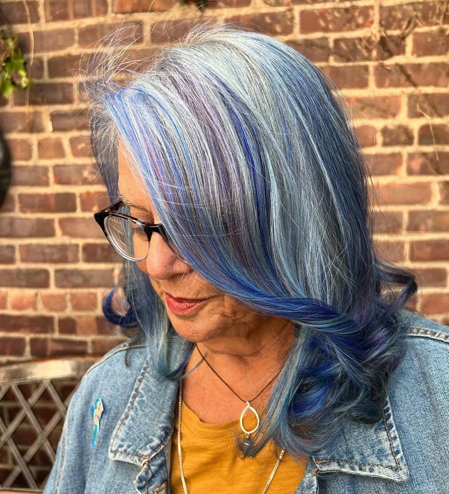 layered gray hair with dark blue highlights
