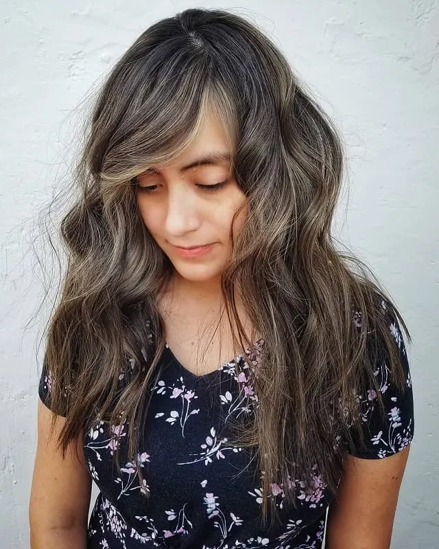highlighted layered hair with side bangs 