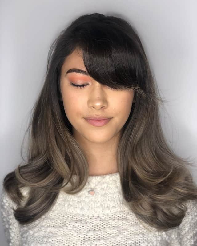 ash layered hair with side bangs 