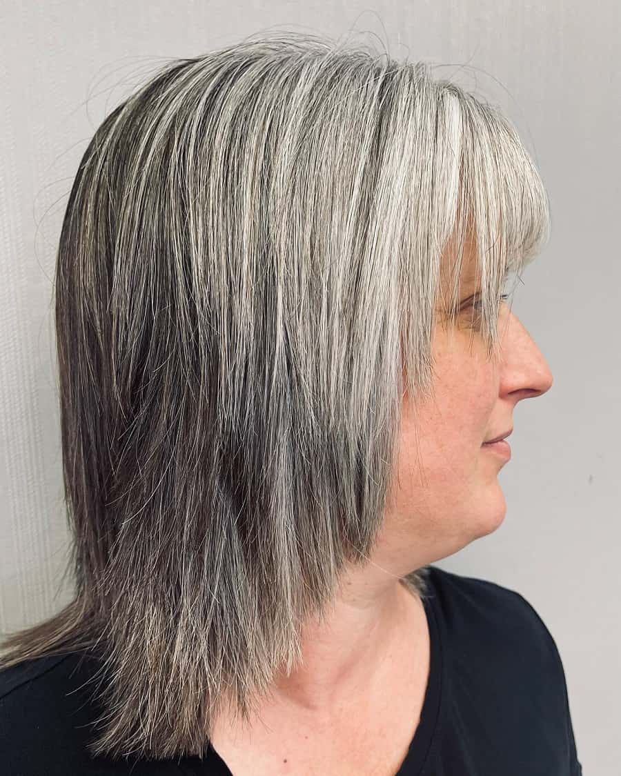 layered hair with white highlights