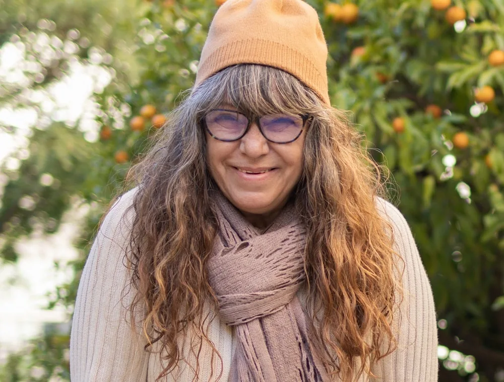 layered haircut for over 50 with glasses